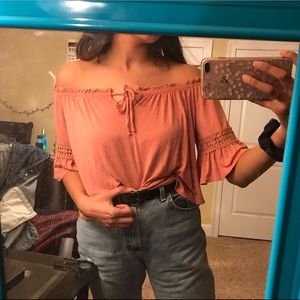 pink off the shoulder shirt